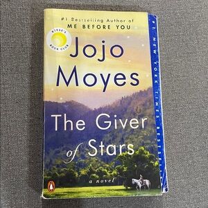 The Giver of Stars- JoJo Moyes. Paperback